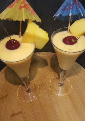 A picture of Mango and cherry drink.