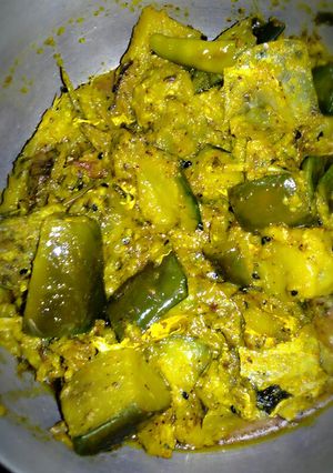 A picture of Brinjal hilsha fish stir fry.