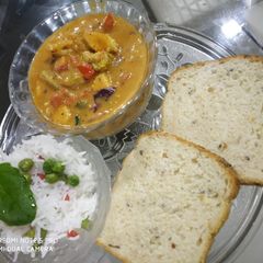 A picture of Thai curry with rice.