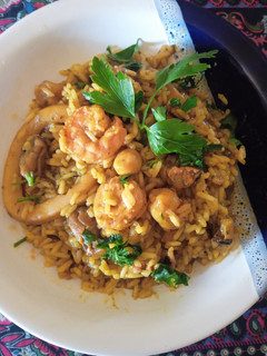 Una foto de Mix de mariscos con arroz
