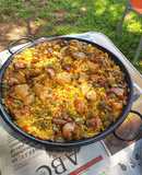 Valencian Paella with Meat Cooked Over Wood Fire