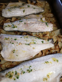 Una foto de Lubina al horno