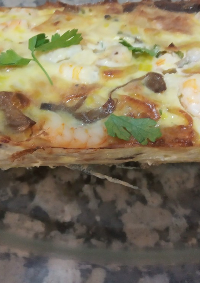 Una foto de Tortilla Setas y gambas