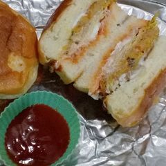 A picture of Cheesy shami kabab burger.