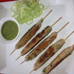 A picture of Shakarkand seekh kebabs.
