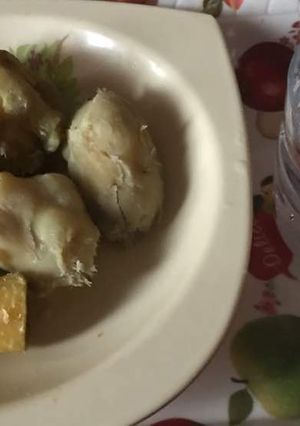 A picture of Boil sweet potato and plantain with chicken sauce.