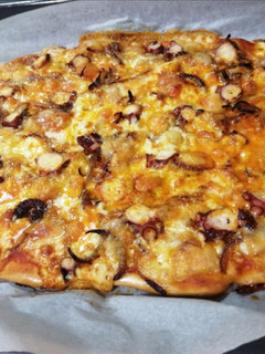 Una foto de Pizza de pulpo Chicote