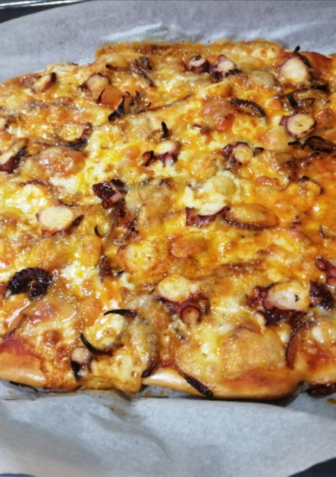 Una foto de Pizza de pulpo Chicote