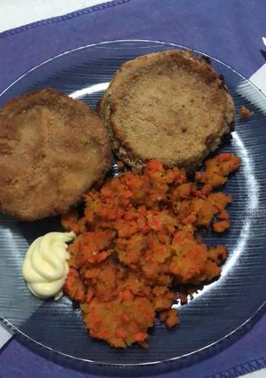 Una foto de Puré de calabaza y milanesa