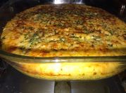 Una foto de polenta gratinada