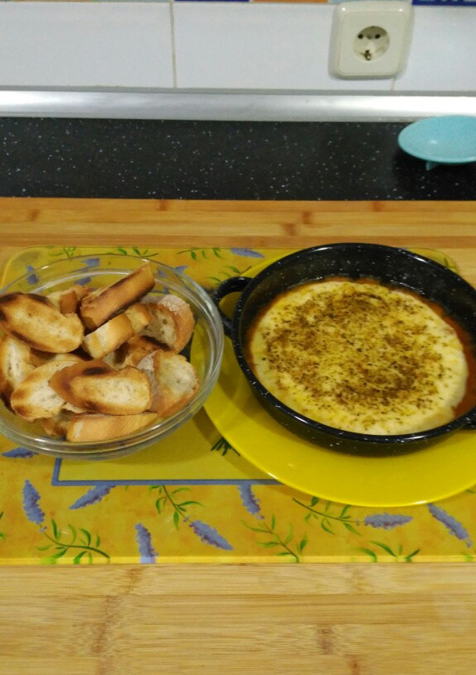 Una foto de Provolone al horno