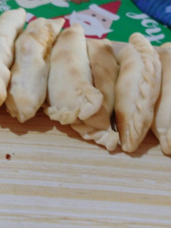 Una foto de Empanadas de POLLO CON SALSA BLANCA