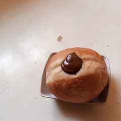 A picture of Chocolate filled doughnut.