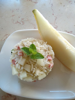 Foto di Insalata di riso basmati con melone giallo e prosciutto cotto