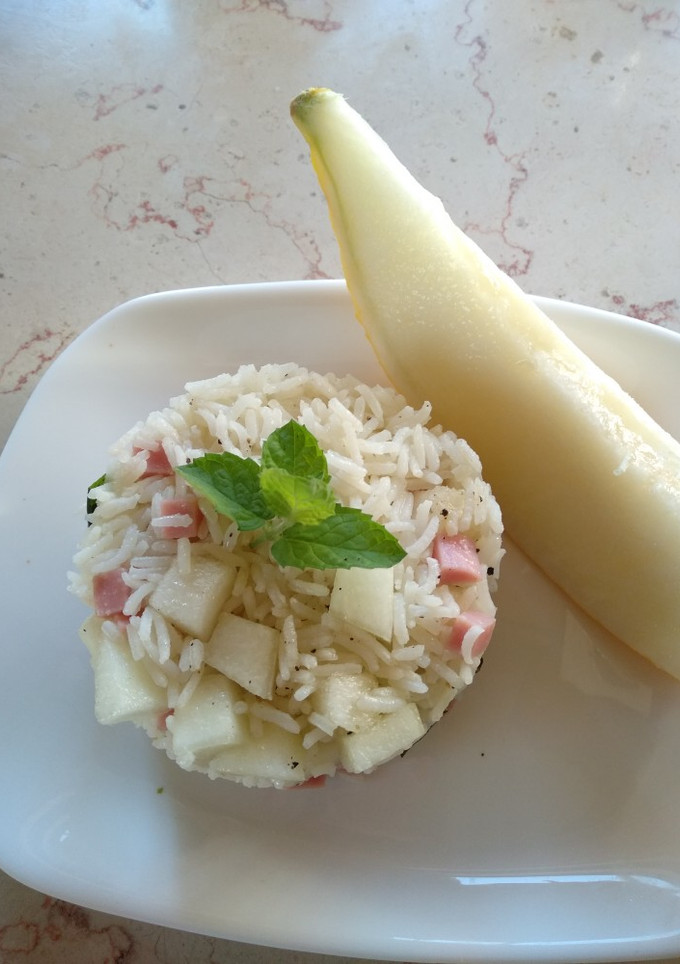 Foto di Insalata di riso basmati con melone giallo e prosciutto cotto