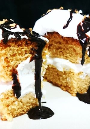 Una foto de Pastelítos rellenos de glasa blanca