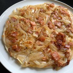 A picture of Pan Fried Onion Bacon Cheese Flatbread.