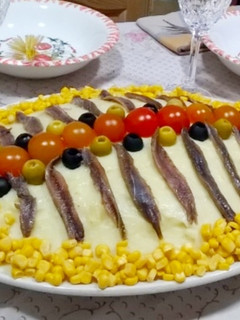 Una foto de Pastel de patata y anchoas