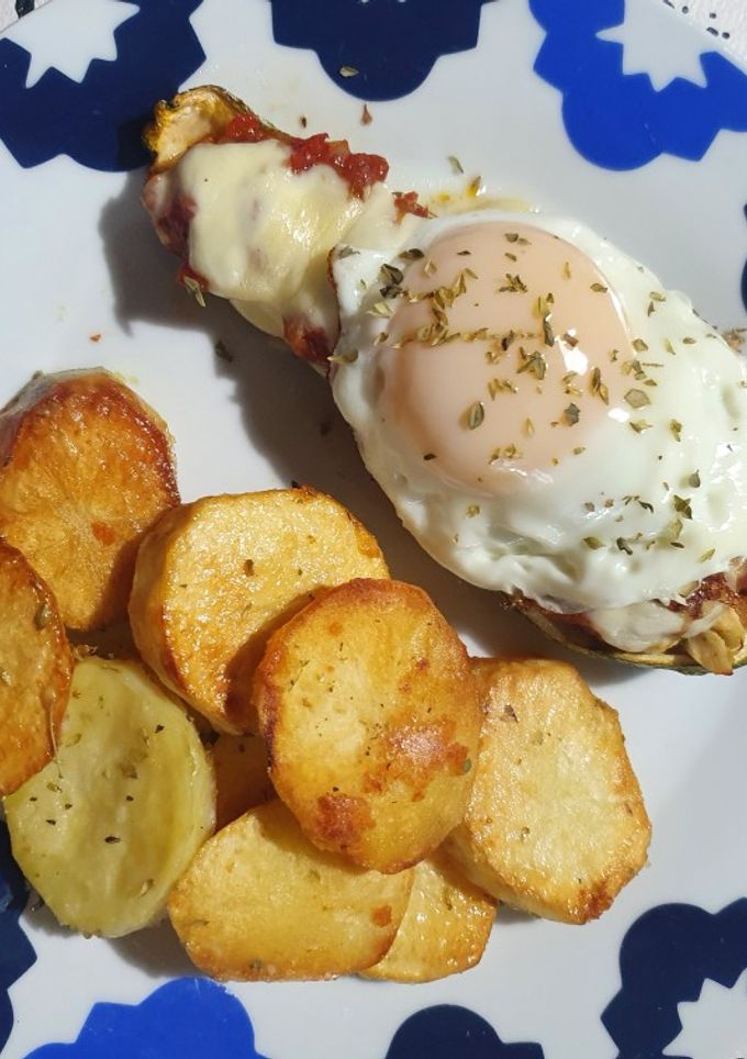 Una foto de Zucchinis rellenos a la pizza