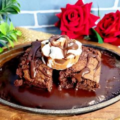Sizzler Fudge Brownie With Homemade Chocolate Sauce A picture of Sizzler Fudge Brownie With Homemade Chocolate Sauce.