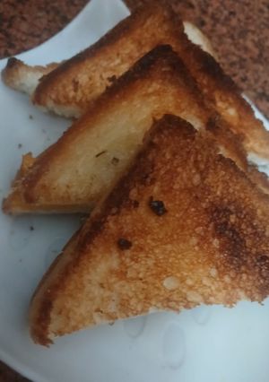 A picture of Cheddar garlic cheese toast.