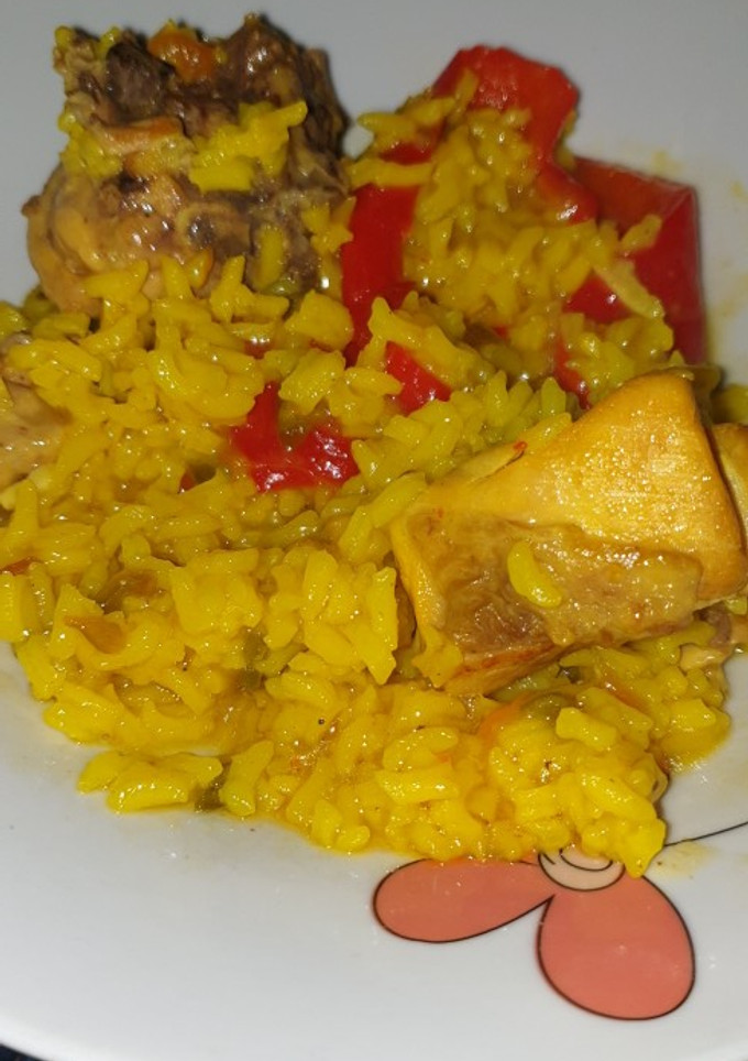 Una foto de Arroz caldoso con pollo olla gm