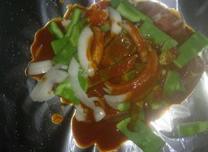 Una foto de Mixiote de cerdo c/ nopales en adobo