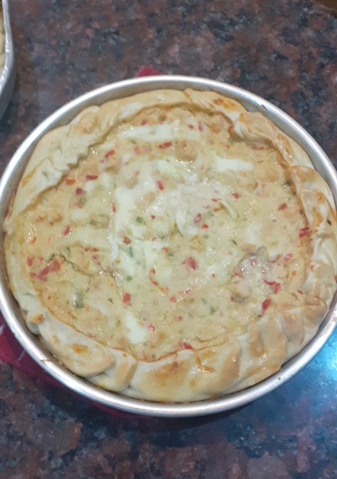 Una foto de Tarta de pollo y salsa blanca