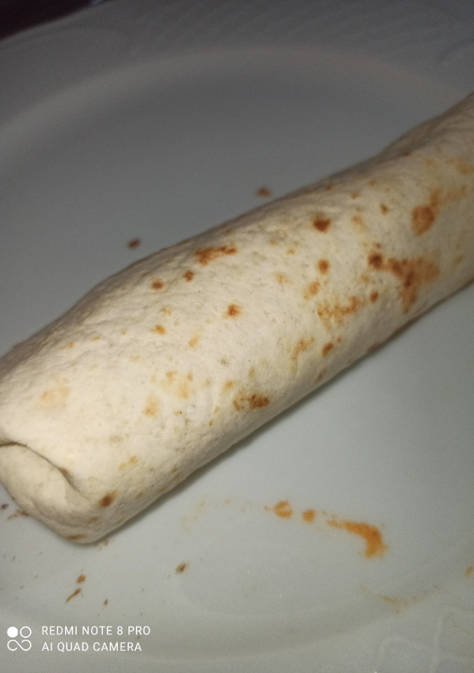 Una foto de Fajitas de hummus de pimiento rojo y lomo