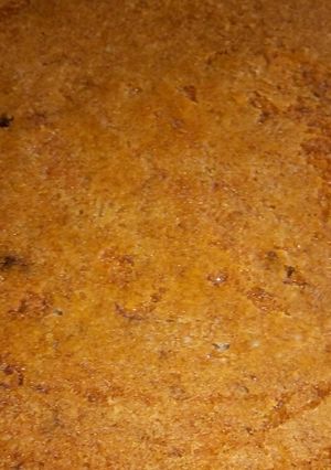 A picture of Naked Moist Lemon-banana cake with chocolate chips.