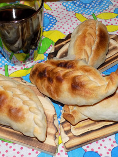 Una foto de Empanadas de bola de lomo (cortada a cuchillo) al horno