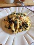 Passatelli asciutti, erbette e prosciutto