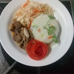 A picture of Steamed vegetable rice, fried beef stew n steamed cabbages.