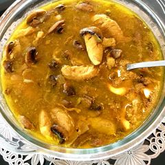 A picture of Saffron chicken mushroom stew.