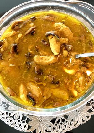 A picture of Saffron chicken mushroom stew.
