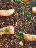 Arroz de ventresca de atún y langostinos