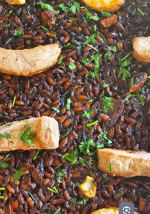 Una foto de Arroz de ventresca de atún y langostinos
