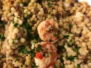 Una foto di fregola con verdura