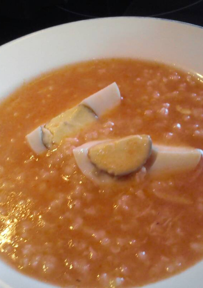 Una foto de Sopa de pescado y arroz