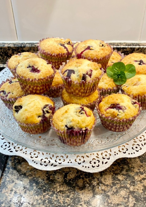 Una foto de Muffins de requesón y arándanos