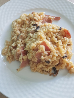 Una foto de Risotto con champiñones y bacon