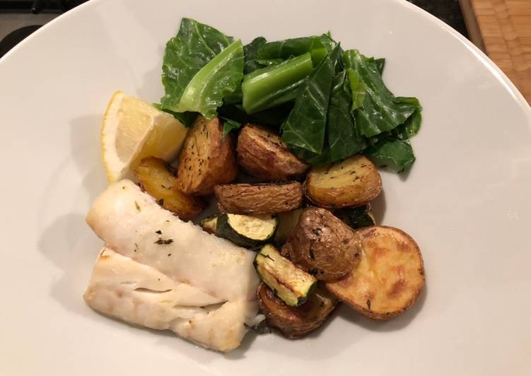 Baked Cod, potatoes and courgette with winter greens