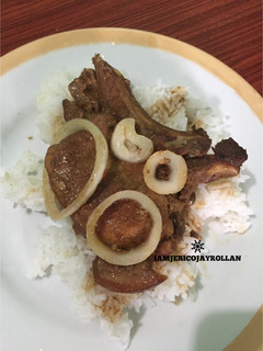 A picture of Pork steak (Bistek tagalog).