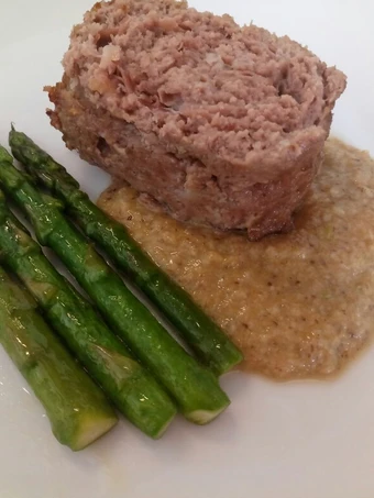 Easy Steps to Prepare Meatloaf with prosciutto, porcini sauce and pan fried asparagus the Delicious Tasty
