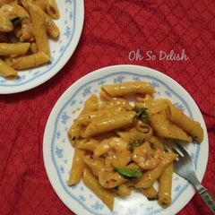A picture of Prawn and roasted red bell pepper basil pasta.