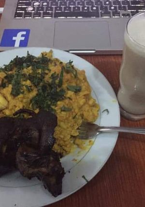 A picture of Ugba with fried snail and coconut milk.