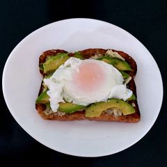 A picture of My Avocado, Poached Egg & soft cheese open Toastie 😋.