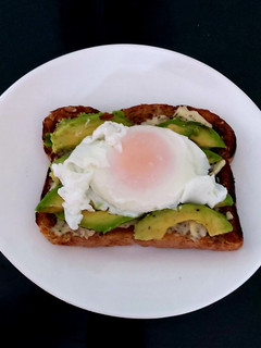 A picture of My Avocado, Poached Egg & soft cheese open Toastie 😋.