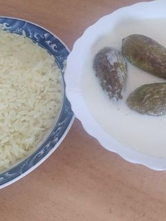 صورة لوصفة شيخ المحشي بلبن أو كوسا مغشي بلبن😋😘