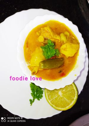 A picture of Mixed dal chicken sambar.